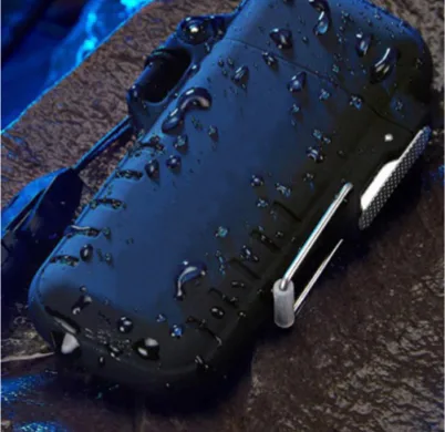 Black Lighter closed case covered in water drops on a wet rock